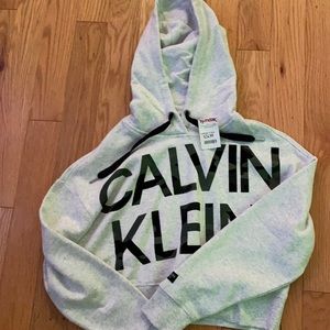 Calvin Klein cropped sweatshirt. The letters are Camo.